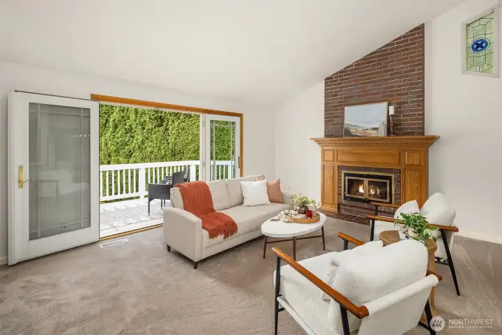 Living room french doors open to the front deck.