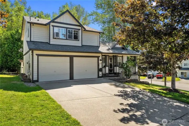 Attractive two-story design with an attached two-car garage.