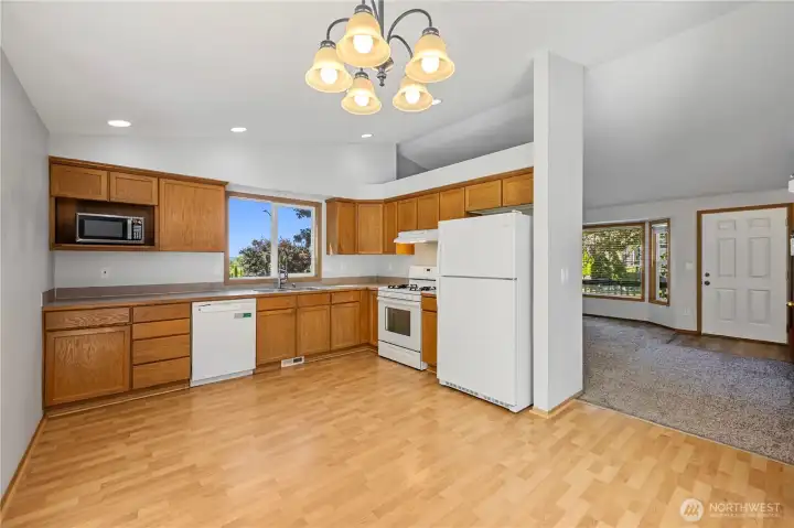 Functional kitchen with lots of cabinetry and prep space.