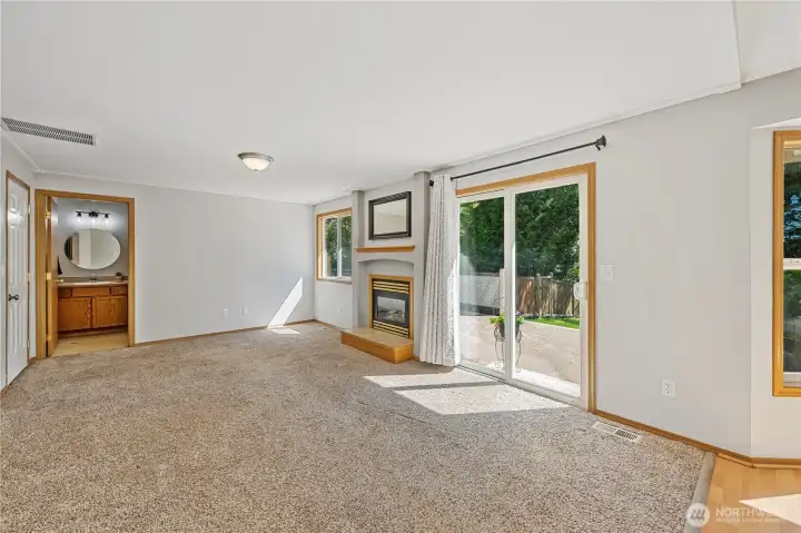 Easy access to the backyard through the sliding glass door.
