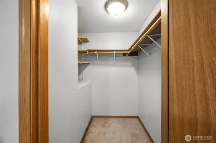 Walk-in closet provides generous storage space.