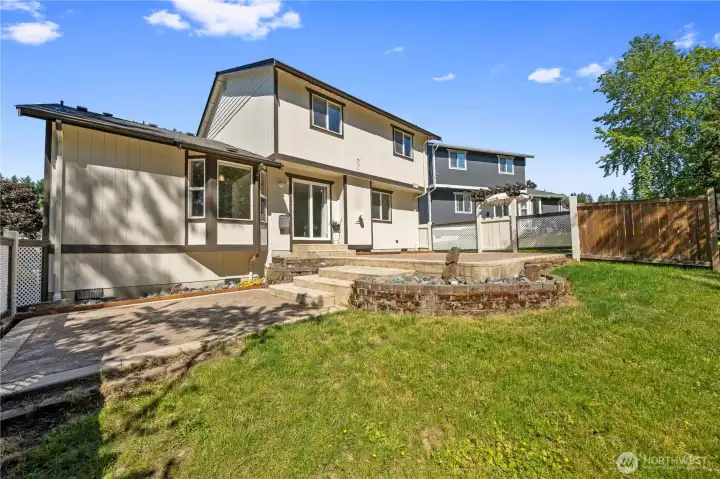 Expansive corner lot offers additional outdoor space and flexibility.