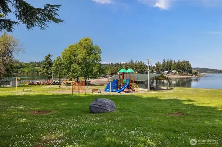 Community WF Park - Spend sunny days at the community waterfront park with playground, picnic space, beach, and views. Community WF Park - Spend sunny days at the community waterfront park with playground, picnic space, beach, and views.