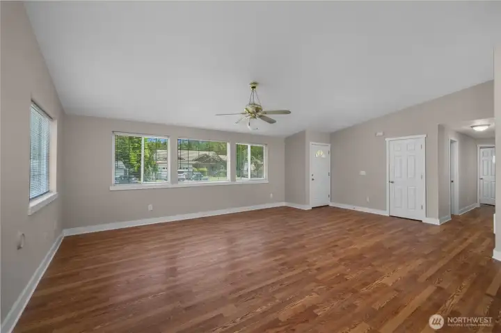 Bright great room with updated flooring, fresh interior paint, large windows, and open layout. Bright great room with updated flooring, fresh interior paint, large windows, and open layout.