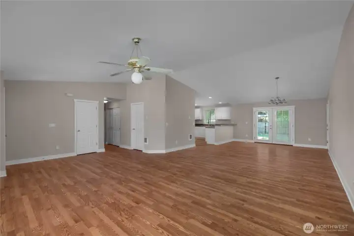 Spacious open floorplan connects the living room, dining area, and kitchen for easy daily living. Spacious open floorplan connects the living room, dining area, and kitchen for easy daily living.
