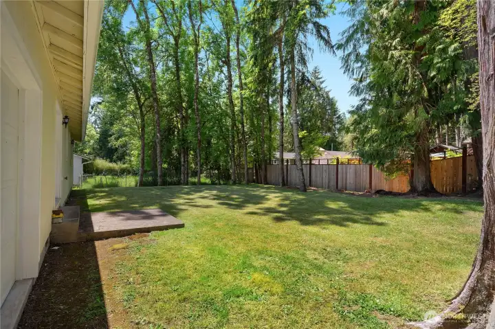 Enjoy a large, tree-lined backyard with room to garden, play, relax, and entertain. Enjoy a large, tree-lined backyard with room to garden, play, relax, and entertain.