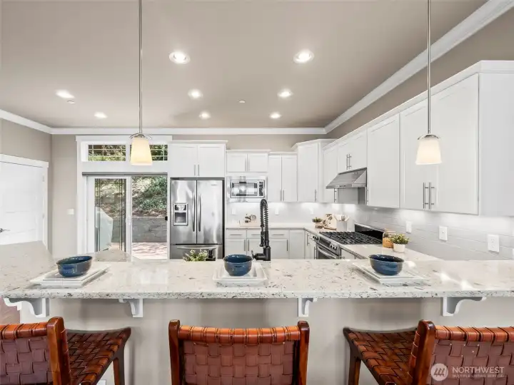 The kitchen is light, bright and designed for entertaining
