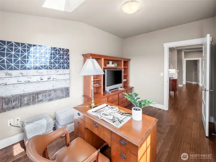 The main floor office is also flooded with natural light