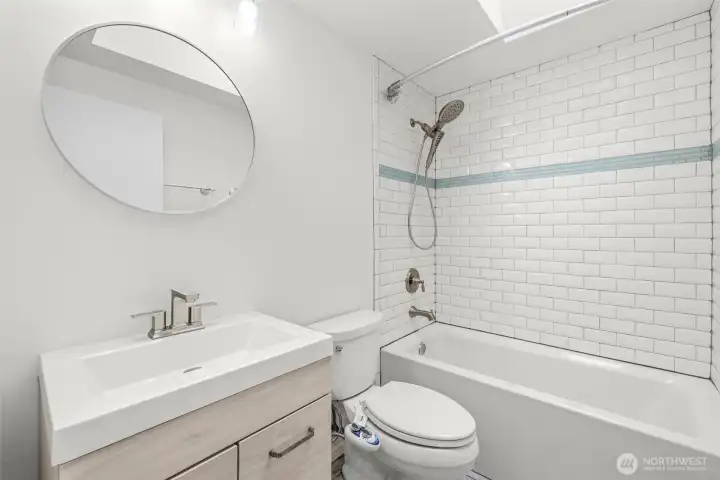 Updated full bath with skylight. Updated full bath with skylight.