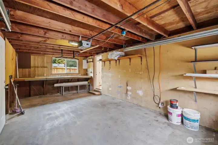 One car garage with work space. One car garage with work space.