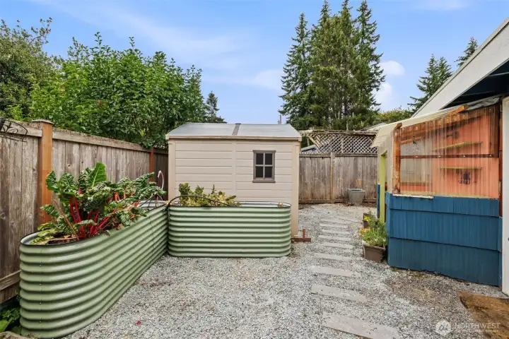 Raised garden beds, potting shed and garden shed. Raised garden beds, potting shed and garden shed.