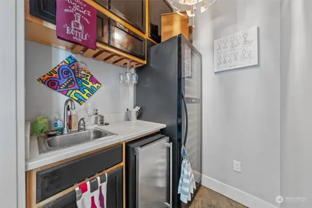 Beverage center is within easy reach of the sitting area and includes a 100+ bottle wine refrigerator, ice maker and bar sink for entertaining family, friends or yourself!!!