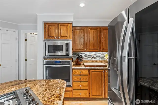 Dimmable undermount lighting is throughout the kitchen cabinetry.