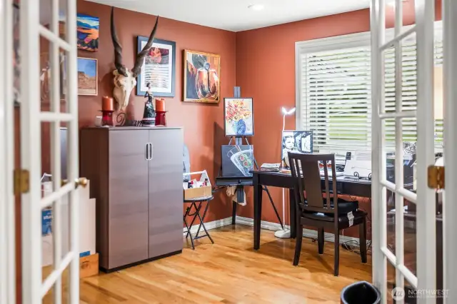 Through french doors sit a wonderful home office that can be used as a legal 5th bedroom on the main floor.