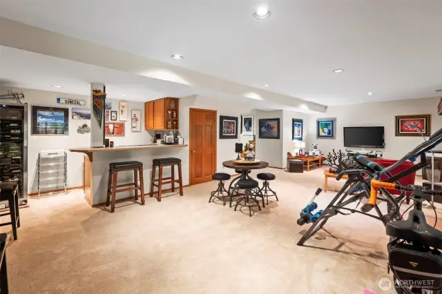 The wet bar host sink and refrigerator for those entertainment filled nights. The basement is so large that it is has its very own gas furnace.