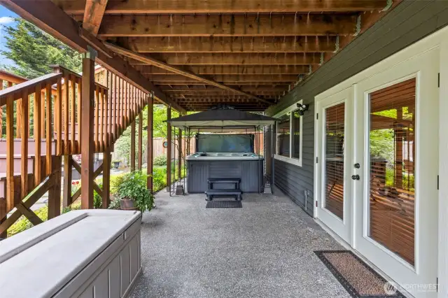 Just outside the 1300 square foot daylight basement doors you enter the rear exterior to the yard.