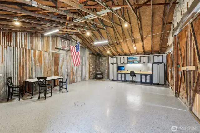 Huge shop – huge shop for all your hobbies. Updated Epoxy floor and corrugated steel maintain the farmhouse charm.