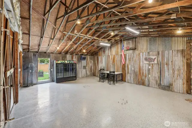 Corrugated steel on the back wall maintains the farmhouse charm. Refrigeration unit – negotiable.