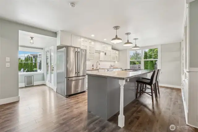 Updated kitchen – concrete counters + plenty of white cabinetry