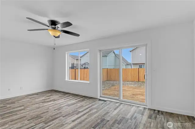 Main Living room with sliding glass door to deck