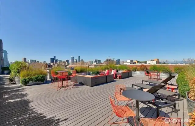 Large Rooftop Deck,  Wonderful views all directions,  Multiple sections for separate gatherings, Several BBQ's available