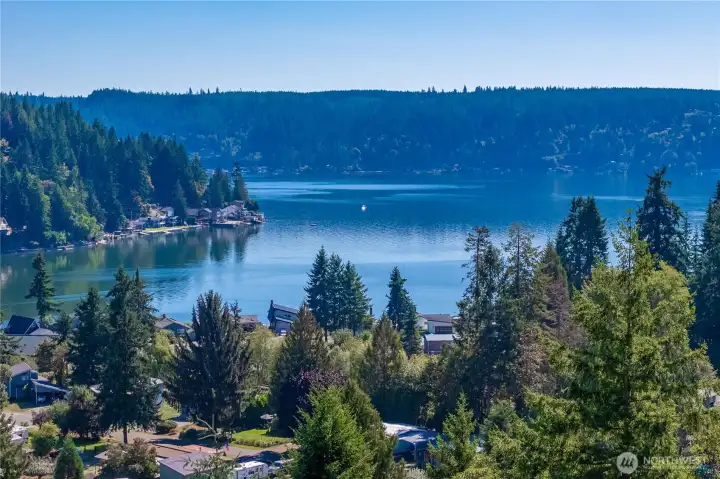 Surrounded by evergreens and natural beauty. Perched above Hood Canal, the property offers a private retreat where trees and water create a perfect Pacific Northwest backdrop.