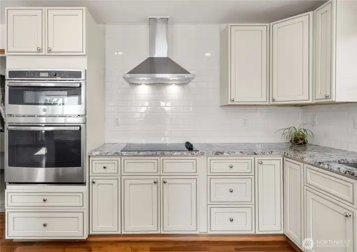 Luxury cabinetry and stainless steel appliances combine style and function in this kitchen