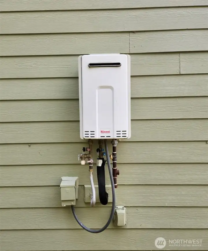 Tankless hot water system already installed—simply add a propane tank to complete the setup.