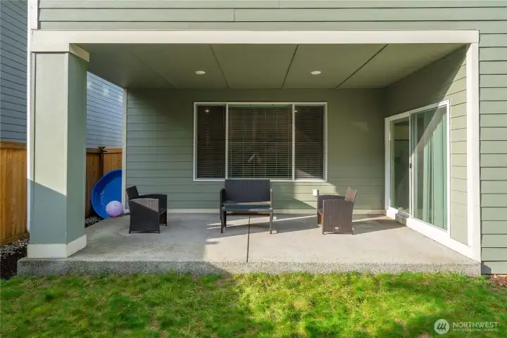 Covered patio with recessed lighting and plenty of space!
