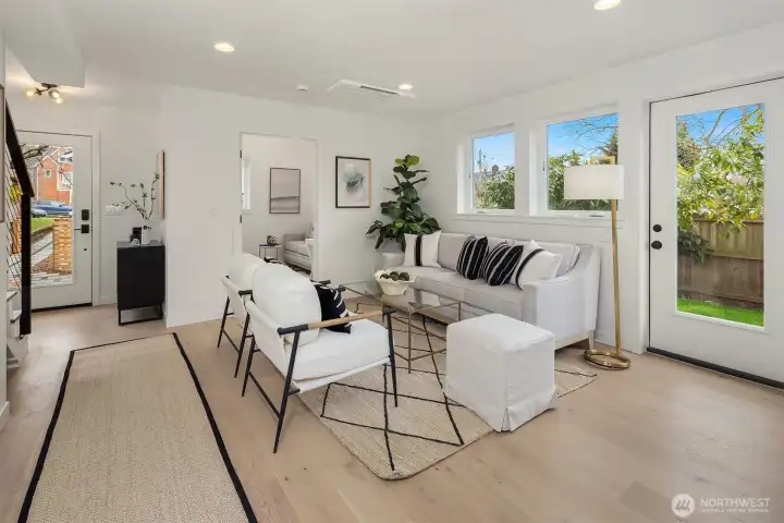 Access to the private back yard and patio through this door.  These windows face south.