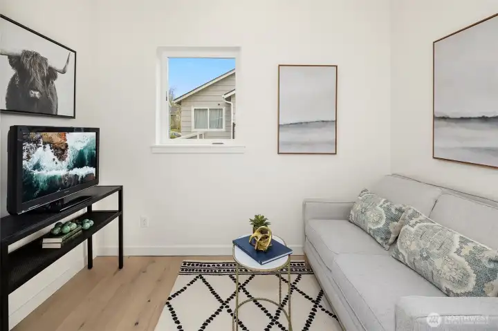 Main floor bedroom.  WE like to call this the flex space as yes, it is a legal bedroom, but it can be so much more!