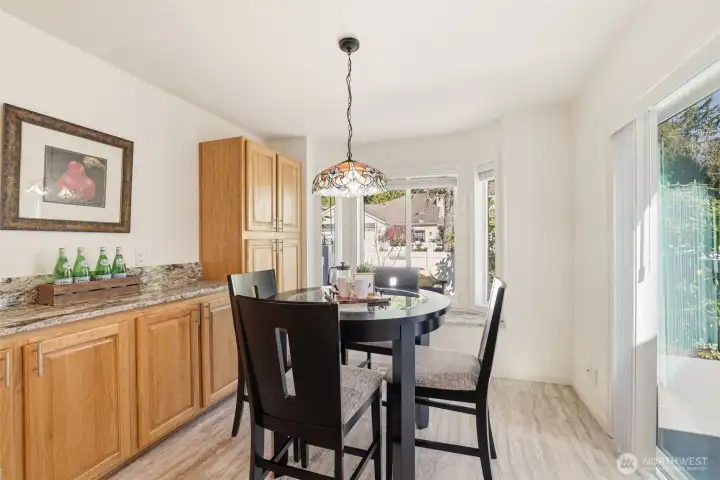 Sunny breakfast nook with garden views.  Slider to garden patio.