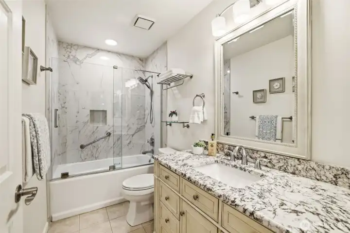 Comfortable guest bedroom. Light and bright with nice separation.