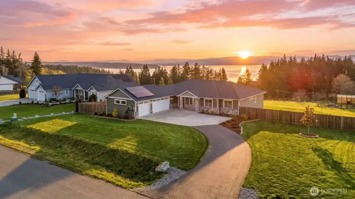 Breathtaking, panoramic views of Mt. Baker, the Cascade Mountains, and Port Susan serve as the daily vista for this 2,515 sqft. luxury home. Virtual sunrise.