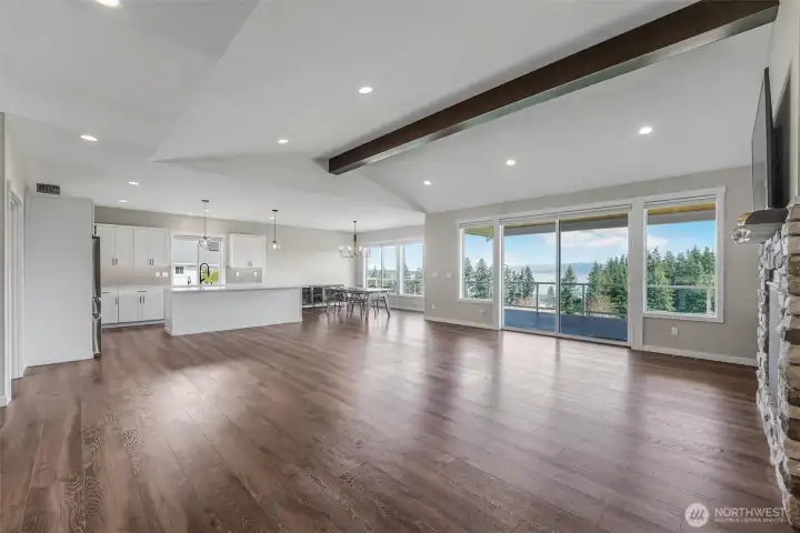 Centrally located on Camano Island within a gated community, this 4-bedroom, 2.25-bathroom home perfectly balances style with the tranquility of island living.