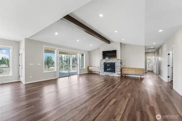 Access to the expansive deck and lovely gas fireplace complete the great room space.