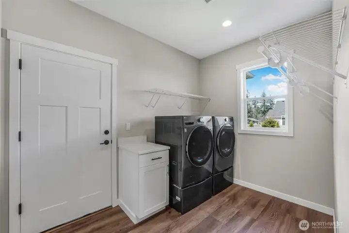 The laundry room has lots of space.