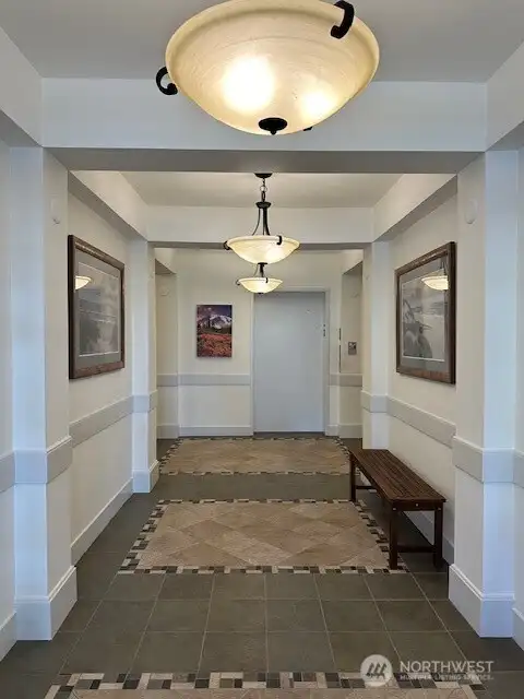 The building has a locked secure entry on one level. The elevator is a short distance after entering the building. The building has a locked secure entry on one level. The elevator is a short distance after entering the building.