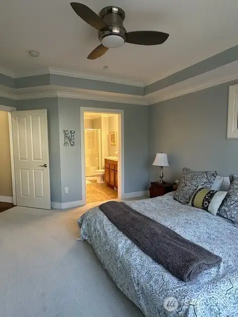 Past the entry and to the left is the main bedroom and en-suite! The bedroom is extra large and can accommodate a king size bedroom set.