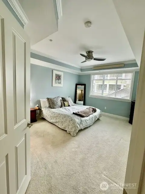 Past the entry and to the left is the main bedroom and en-suite! The bedroom is extra large and can accommodate a king size bedroom set. Past the entry and to the left is the main bedroom and en-suite! The bedroom is extra large and can accommodate a king size bedroom set.