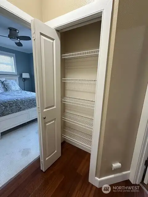 A linen closet near the bedrooms.
