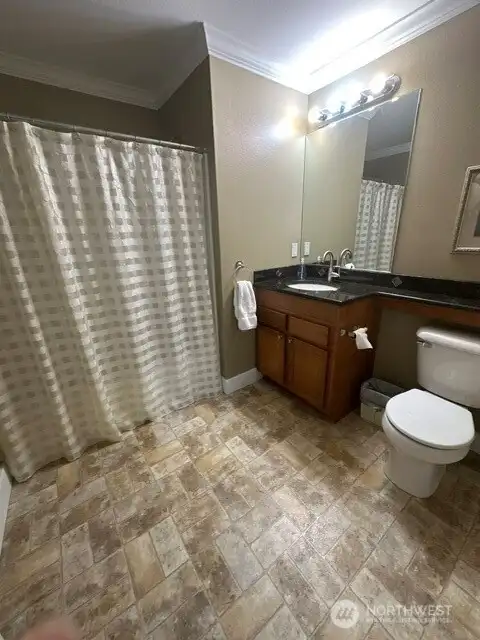 A guest full bath is located near the two bedrooms. A guest full bath is located near the two bedrooms.