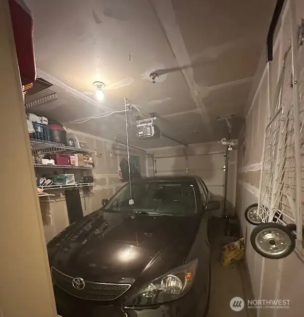 One car garage and storage (not pictured) comes with the condo too. From your car you just enter the hallway that leads to the elevator.  No going outside or down around the corner to get to your building.