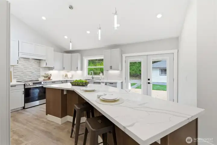 12' breakfast bar island adds lots of seating, storage and work/prep space