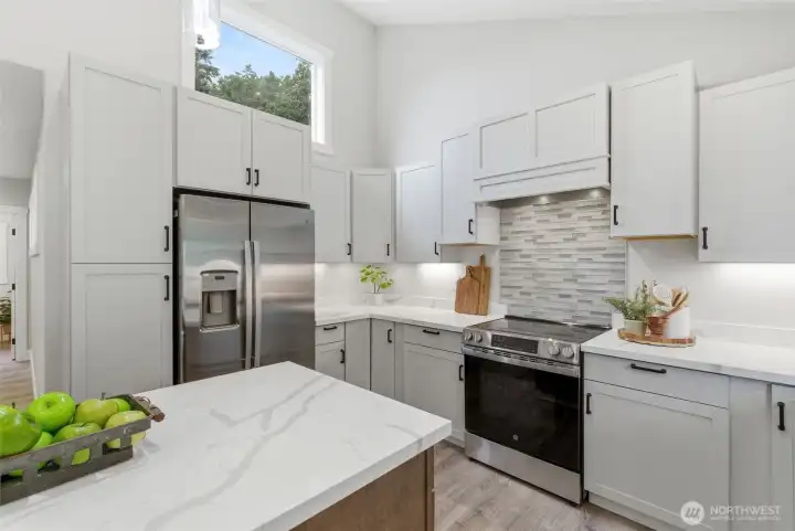 Brand new- Stainless steel GE Profile appliances included  Abundance of cabinets, many with pull-out features for easy access to those items in the back.