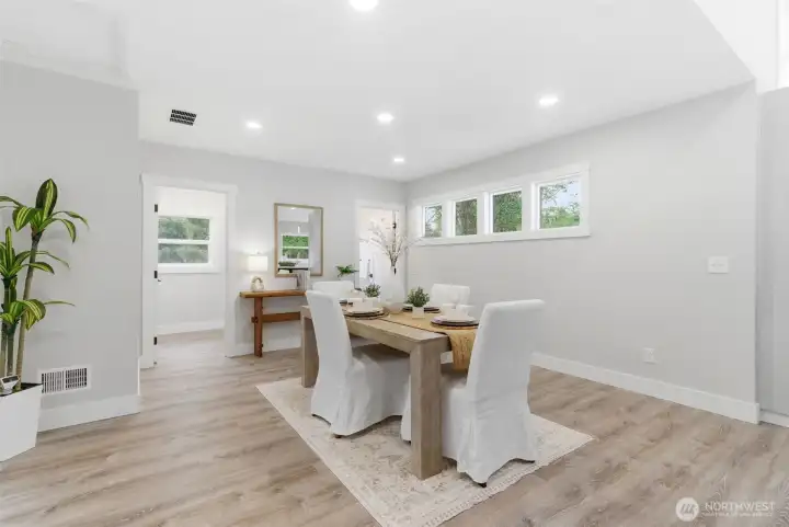 Formal dining room is open to the kitchen for easy entertaining- Easily converted to a REC room or family room