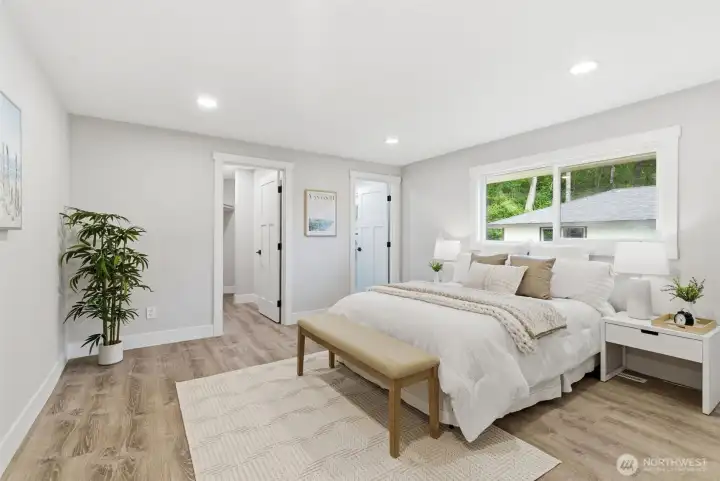 Relaxing primary retreat includes a private bath and 2 closets