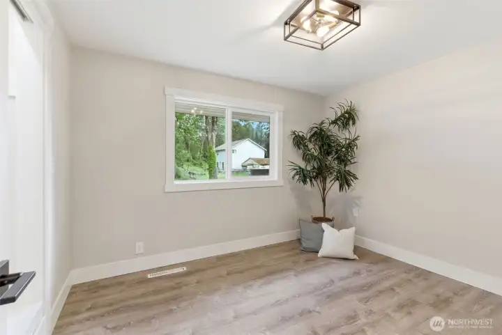 Third bedroom, home office, gym, etc.  The doors throughout are solid core so noise transmission is minimized.