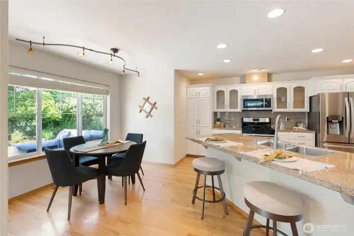 Lots of room to gather around the kitchen while maintaining work space