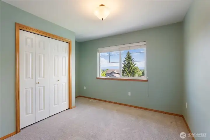 Second upstairs bedroom with large closet